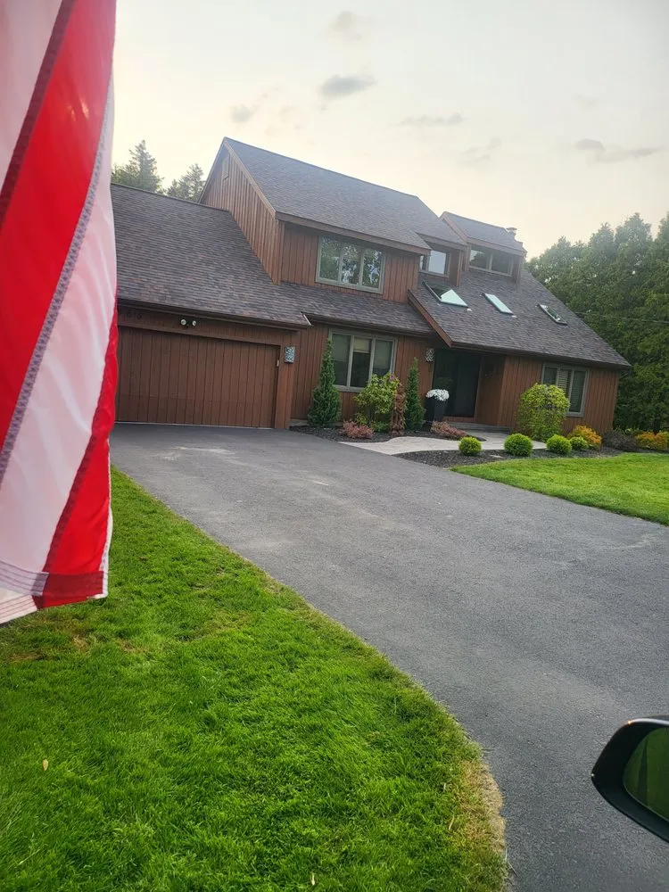 Slide of Adonis Roofing