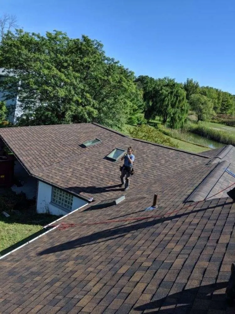 Slide of Adonis Roofing