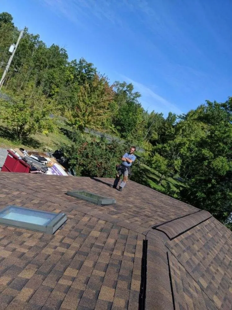 Slide of Adonis Roofing