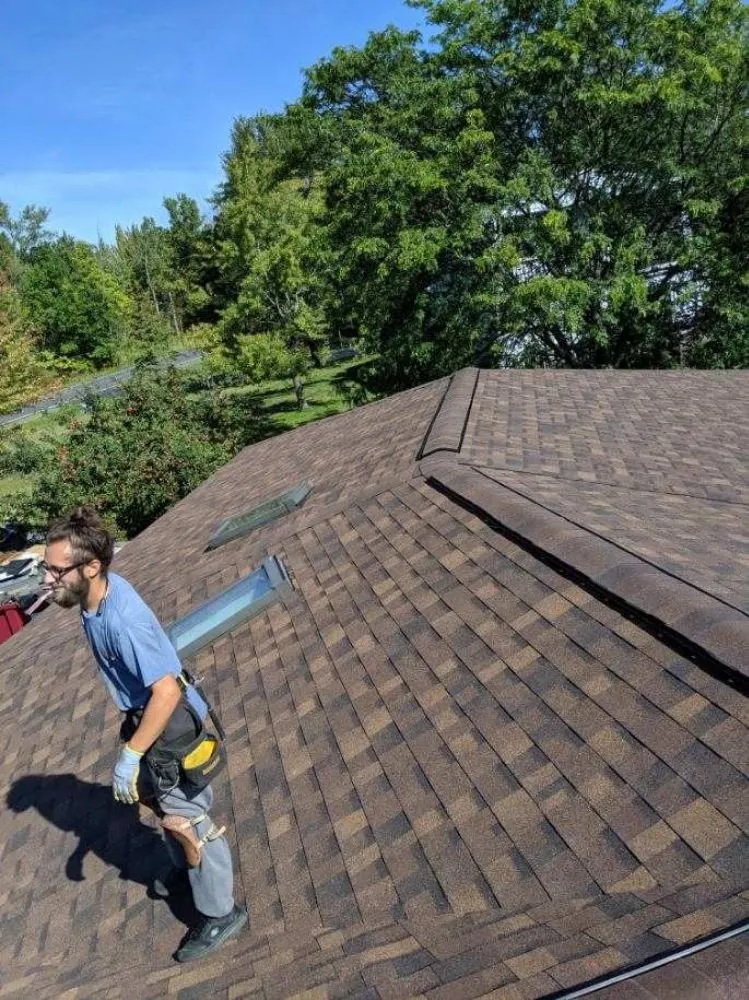 Slide of Adonis Roofing