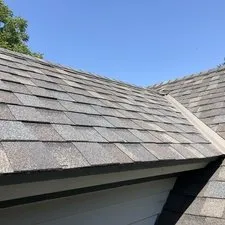 Slide of Adonis Roofing