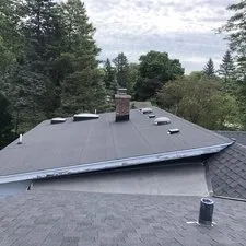 Slide of Adonis Roofing