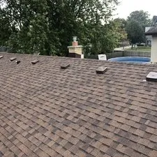 Slide of Adonis Roofing