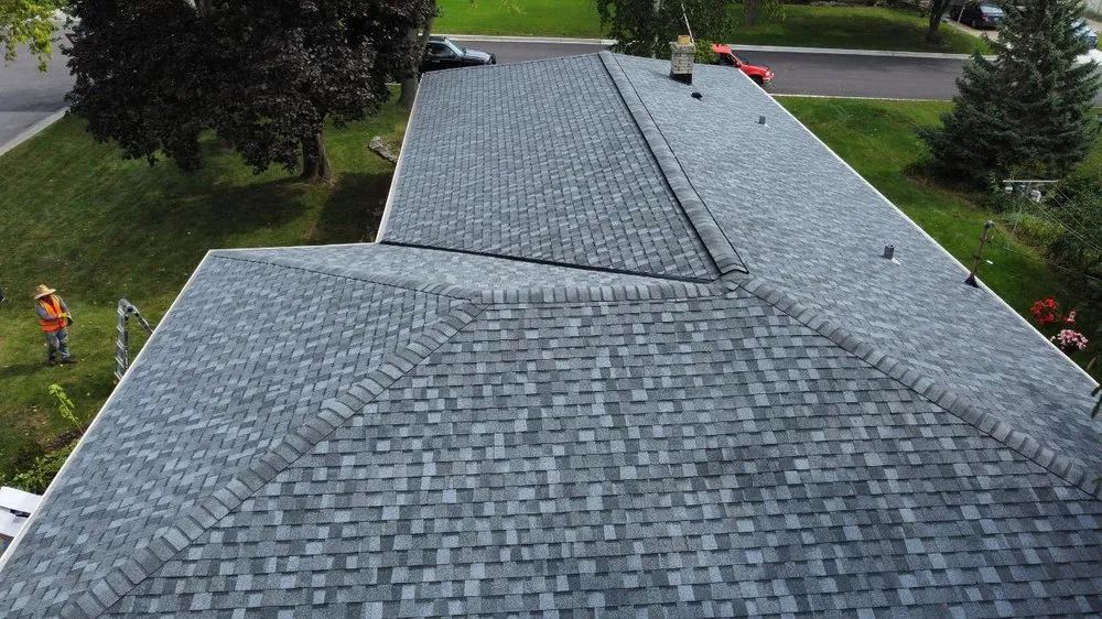 Slide of Adonis Roofing