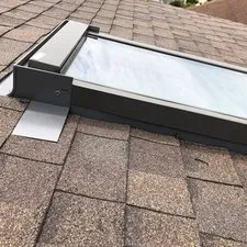 Slide of Adonis Roofing