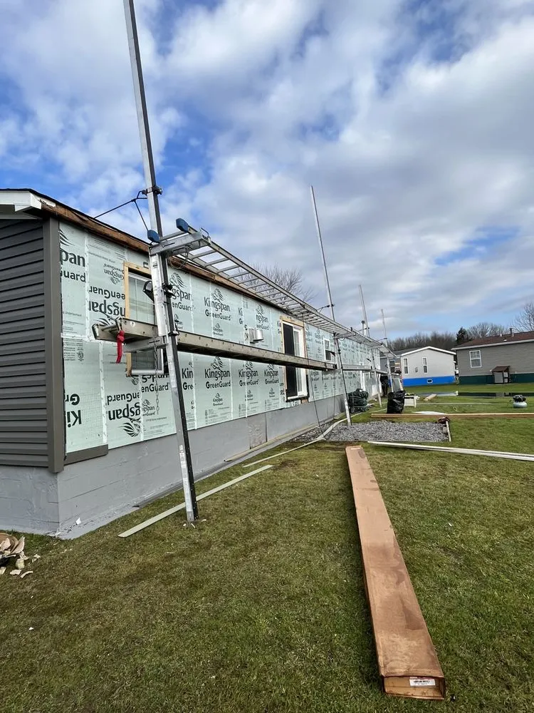 Slide of Adrian Contractors