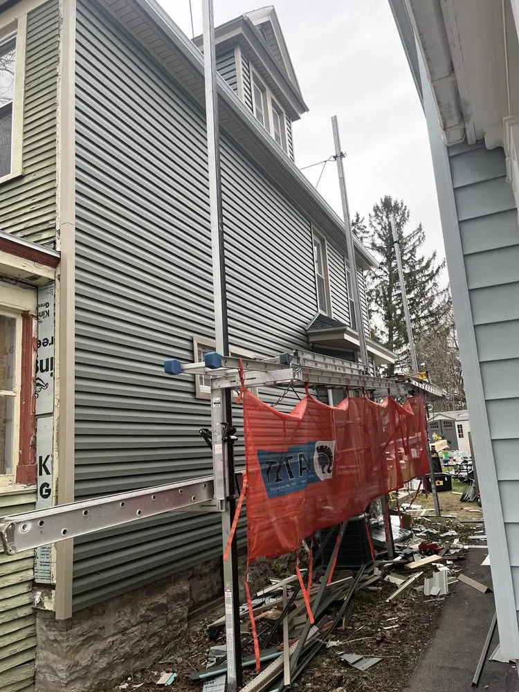 Slide of Adrian Exteriors