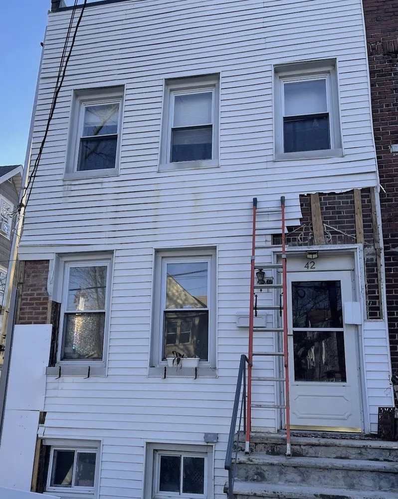 Slide of Adrian Exteriors