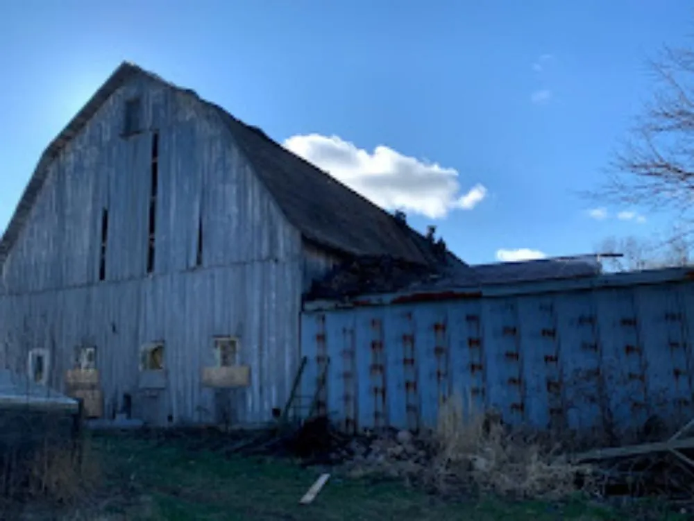 Emergency shingle roofing service after storm damage across Greenbay, WI - Advanced Contracting