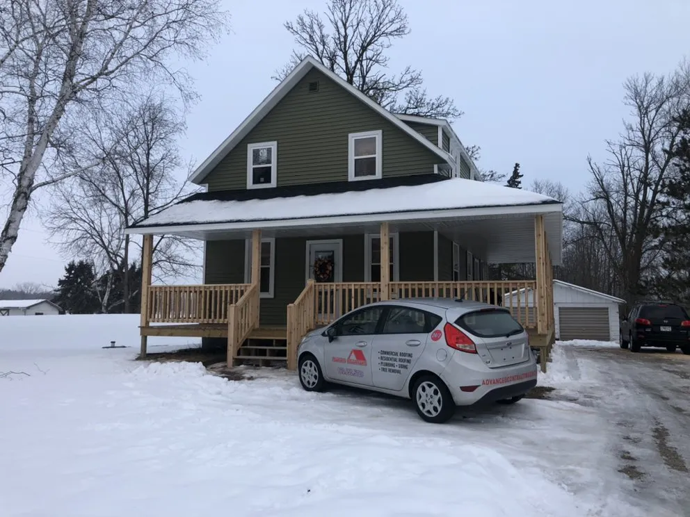 Emergency shingle roofing service in Greenbay, WI by Advanced Contracting