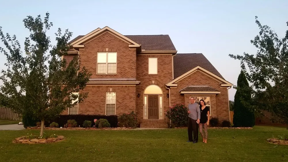 Slide of Advanced Roofing & Construction