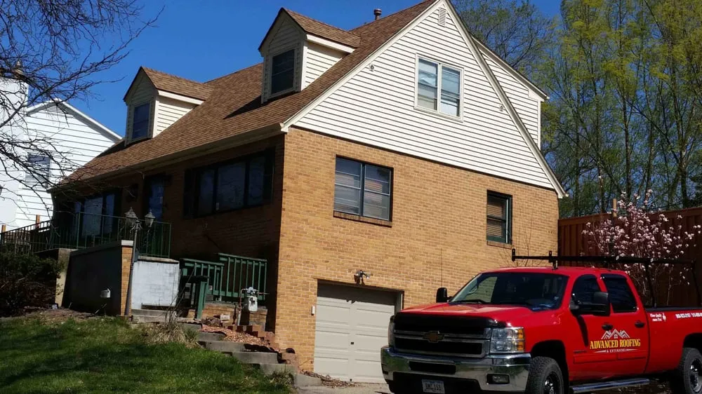 Slide of Advanced Roofing & Exteriors