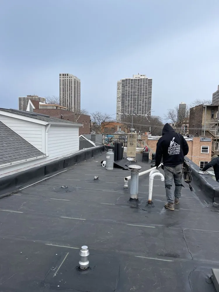 Slide of Advanced Roofing & Masonry