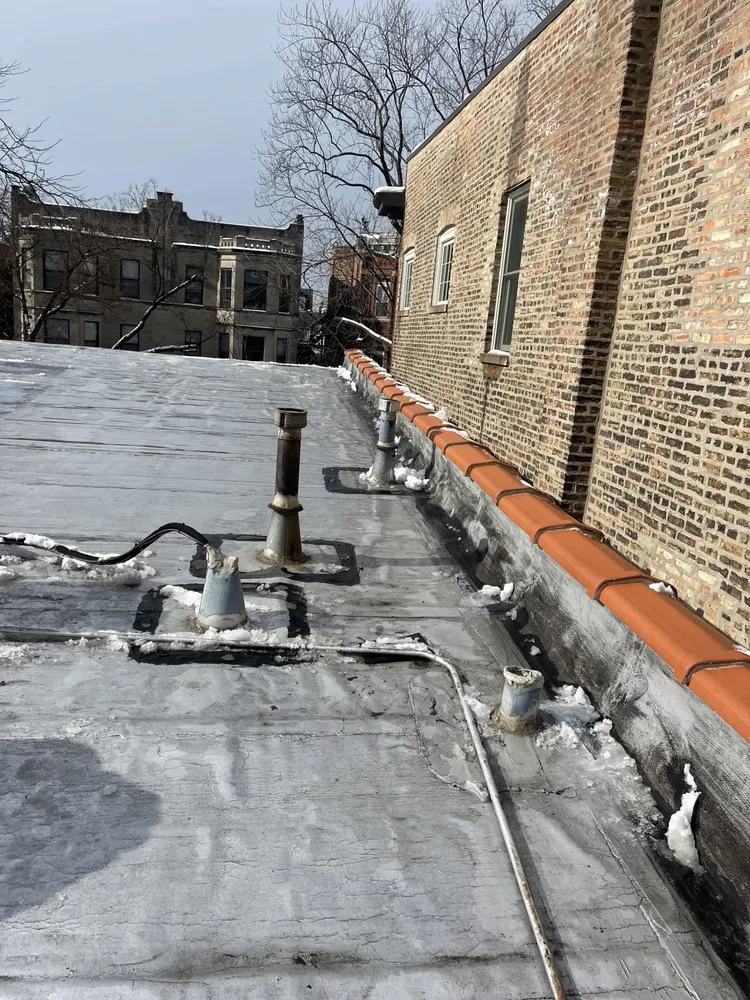 Slide of Advanced Roofing & Masonry