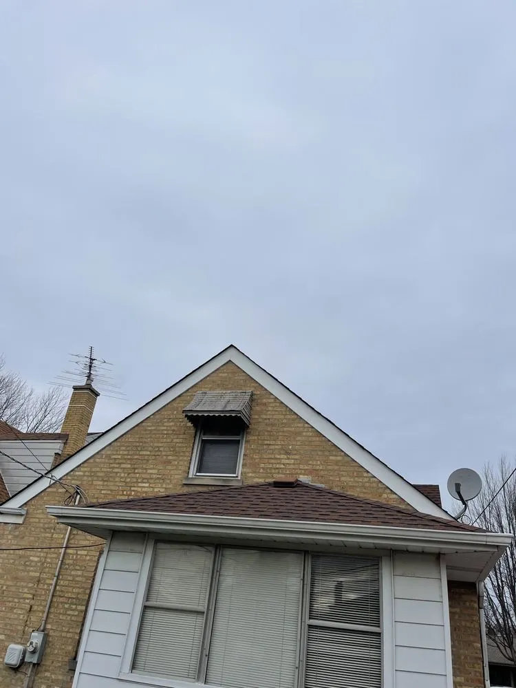 Slide of Advanced Roofing & Masonry