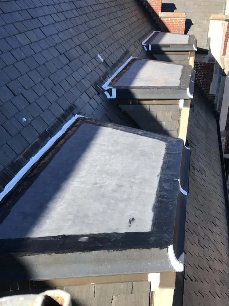 Slide of Advanced Roofing & Paving