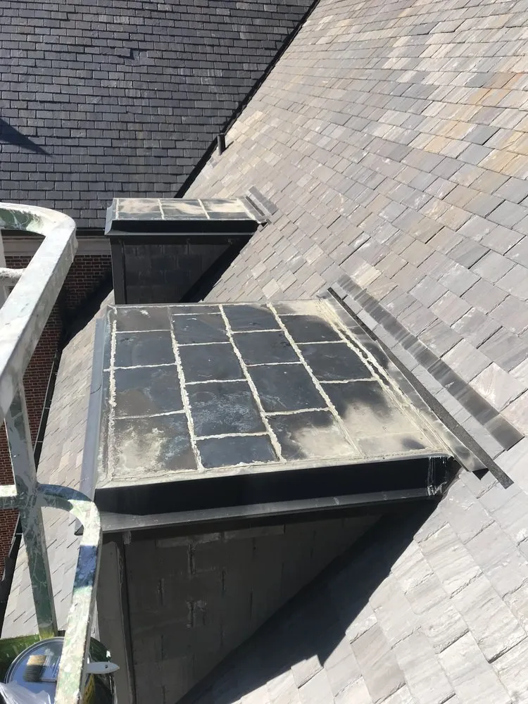 Slide of Advanced Roofing & Paving