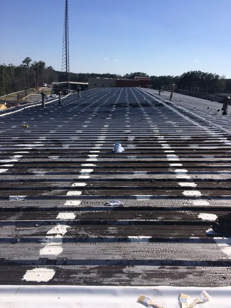 Slide of Advanced Roofing & Paving