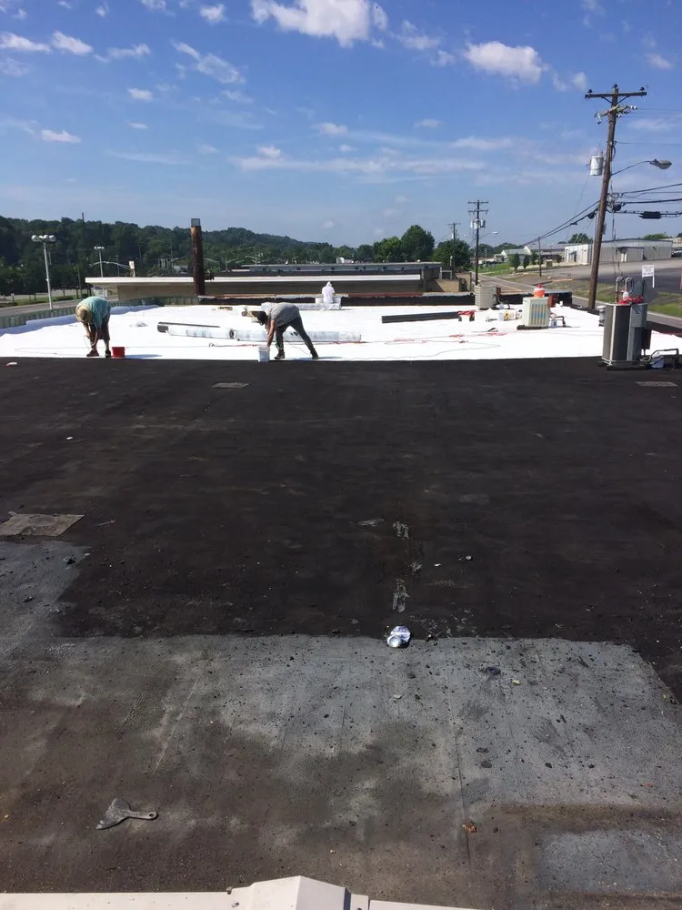 Slide of Advanced Roofing & Paving