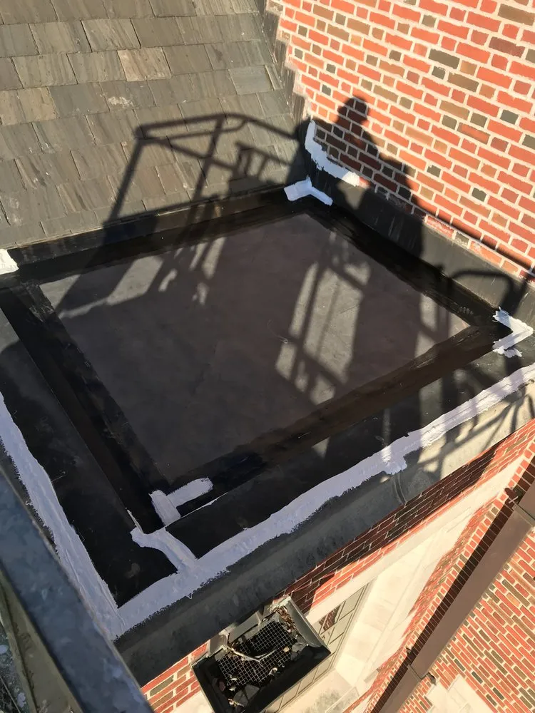 Slide of Advanced Roofing & Paving