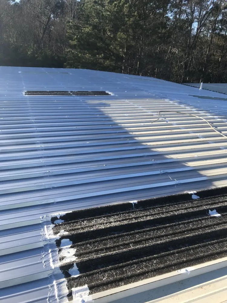 Slide of Advanced Roofing & Paving