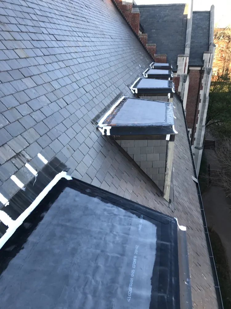 Slide of Advanced Roofing & Paving