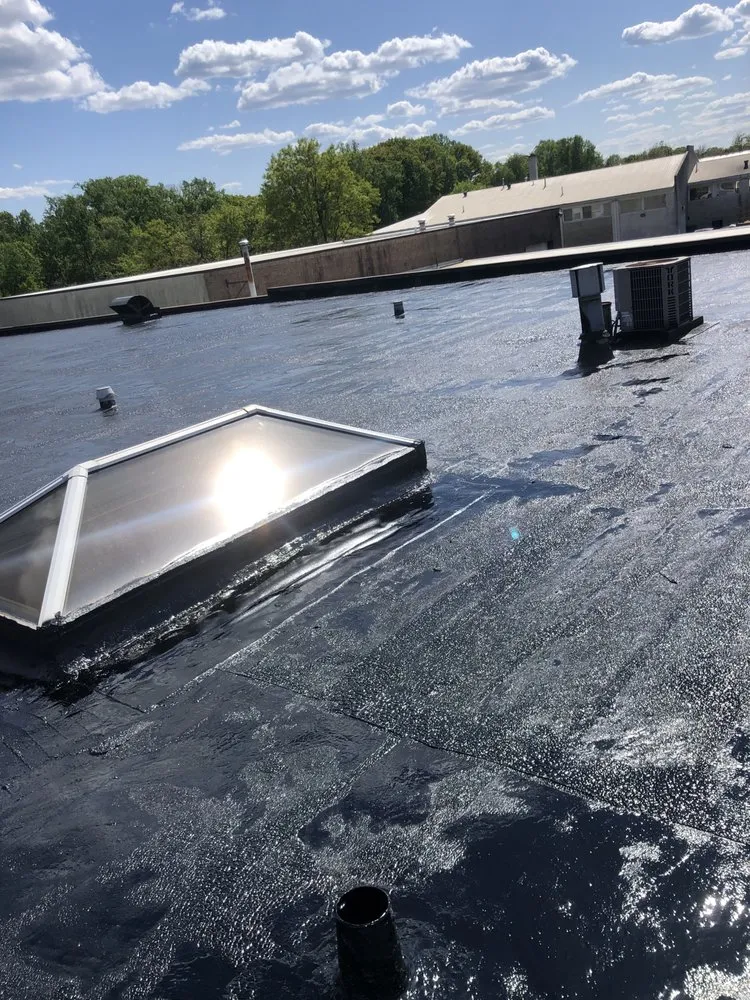Slide of Advanced Roofing & Sealcoating