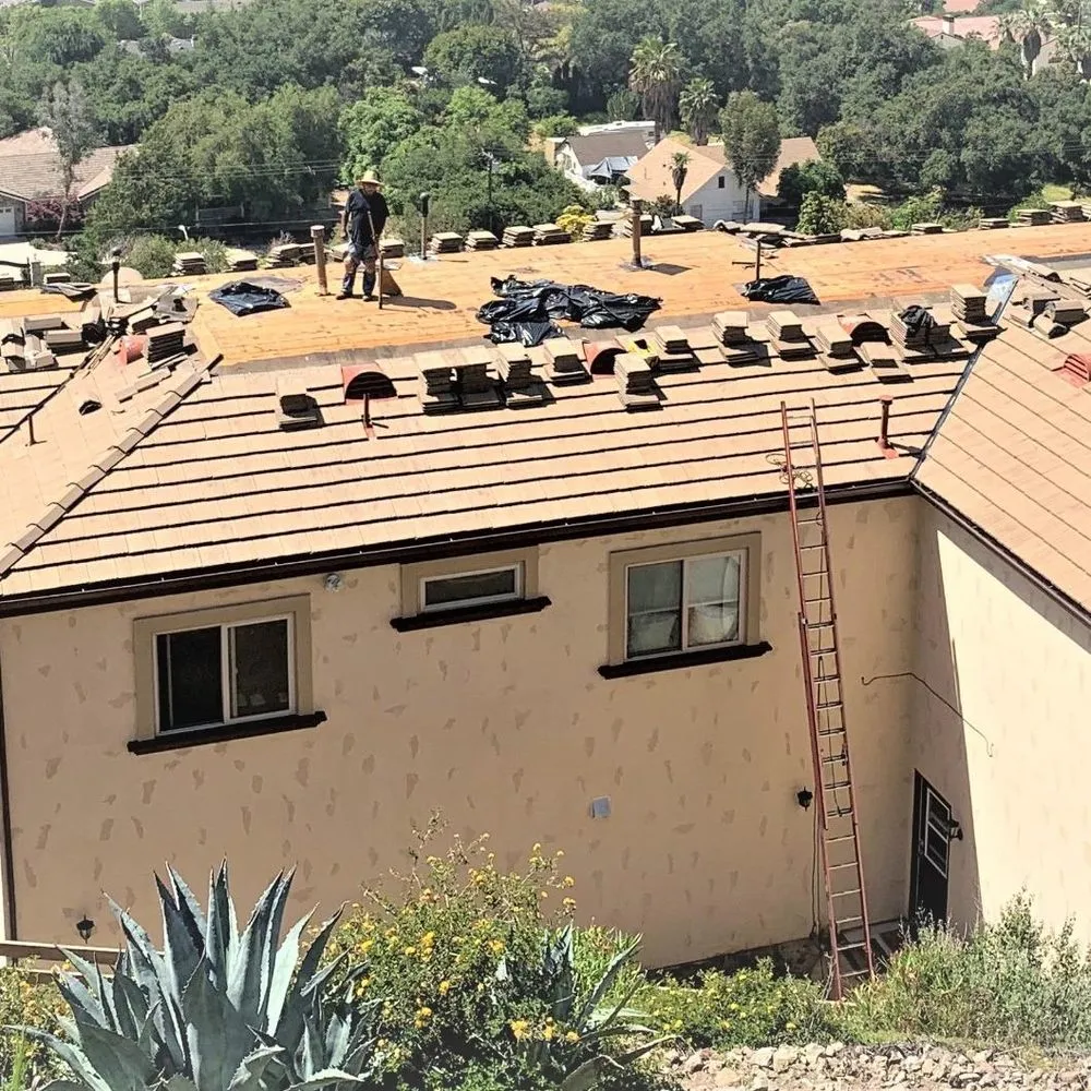 Slide of Advanced Roofing & Sons