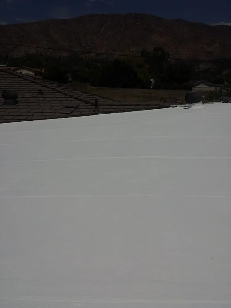 Slide of Advanced Roofing & Sons