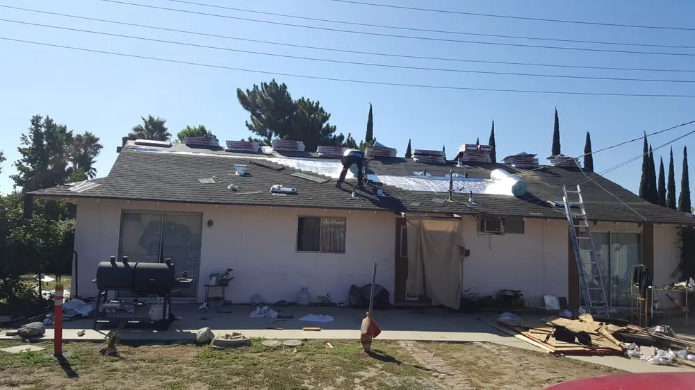 Slide of Advanced Roofing & Sons