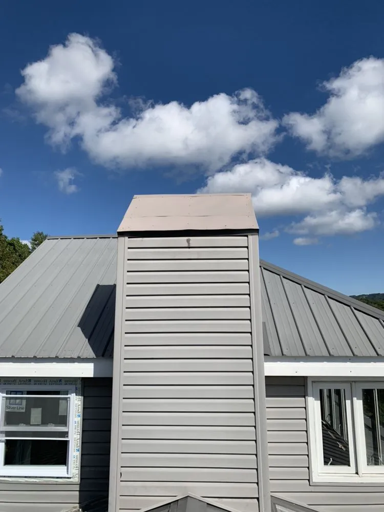 Slide of Advanced Roofing and Construction