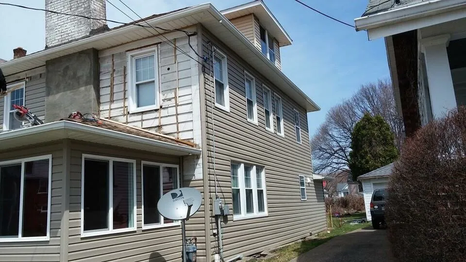 Slide of Advanced Roofing and Construction