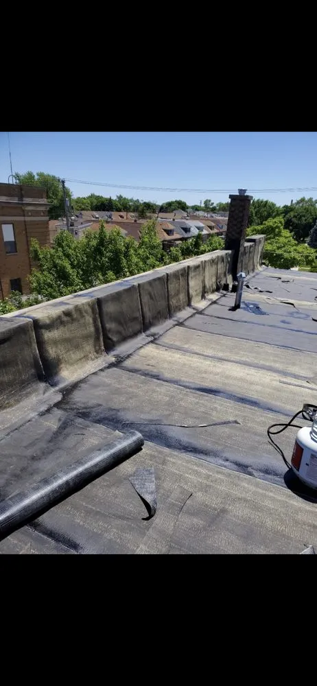 Slide of Advanced Roofing Chicago