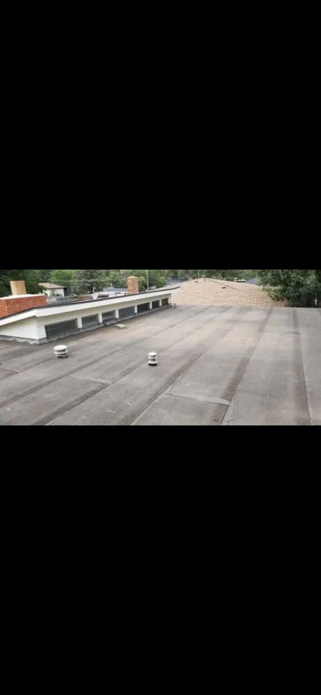 Slide of Advanced Roofing Chicago