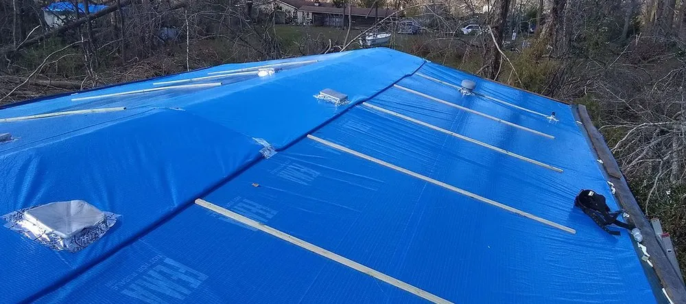 Slide of A&E Construction & Roofing Group