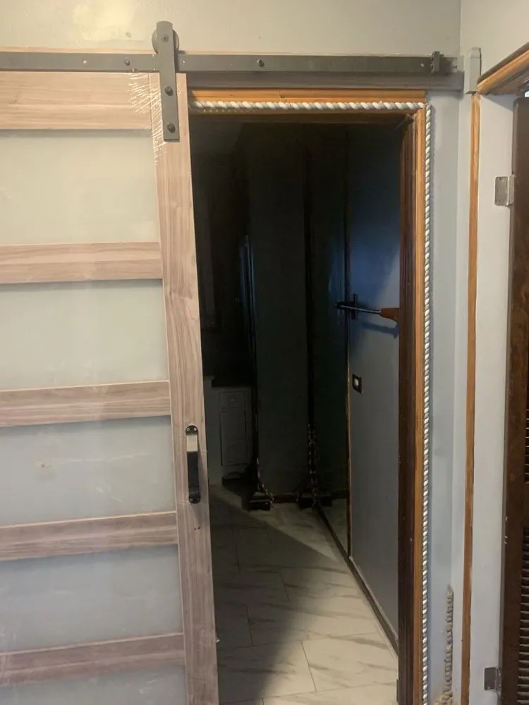 Slide of A&E Construction & Roofing Group