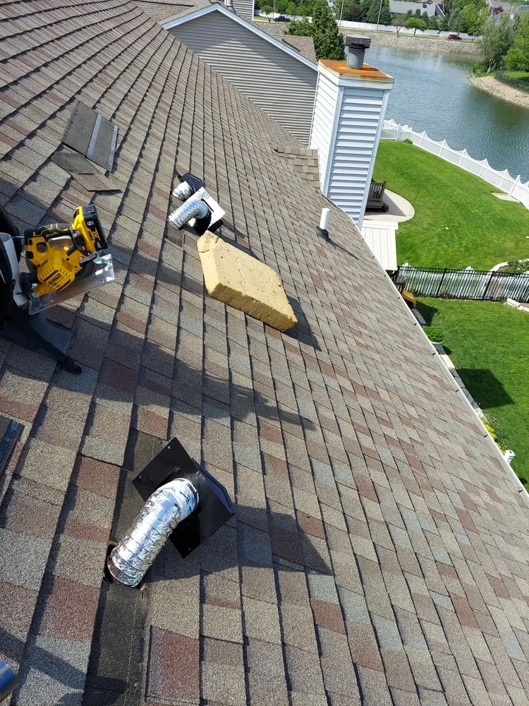 Slide of A&E Roofing & Construction