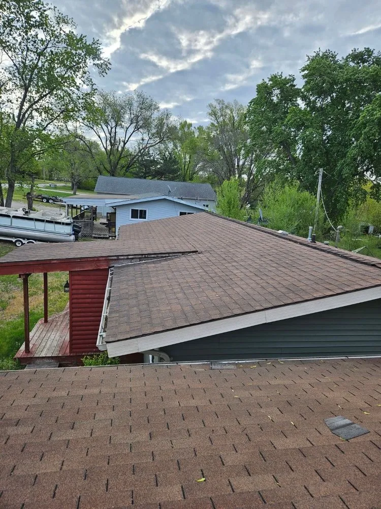 Slide of A&E Roofing & Construction