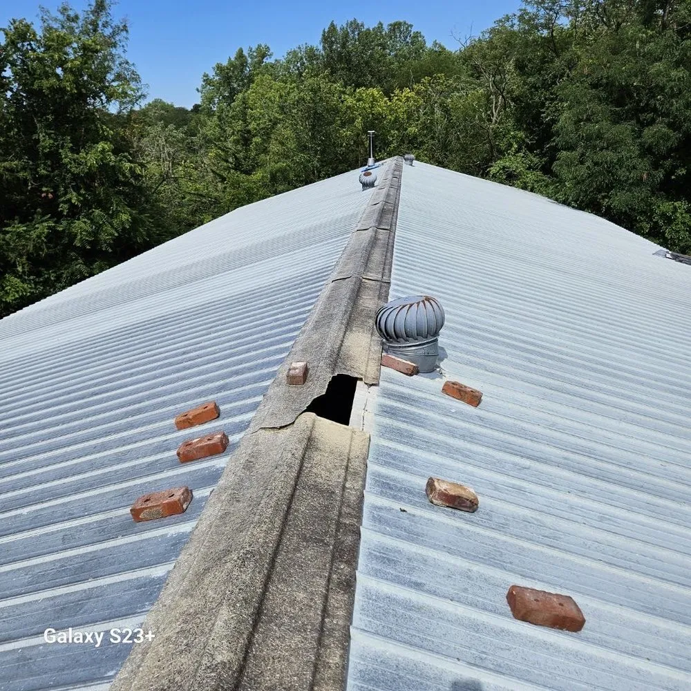 Slide of A&E Roofing & Construction