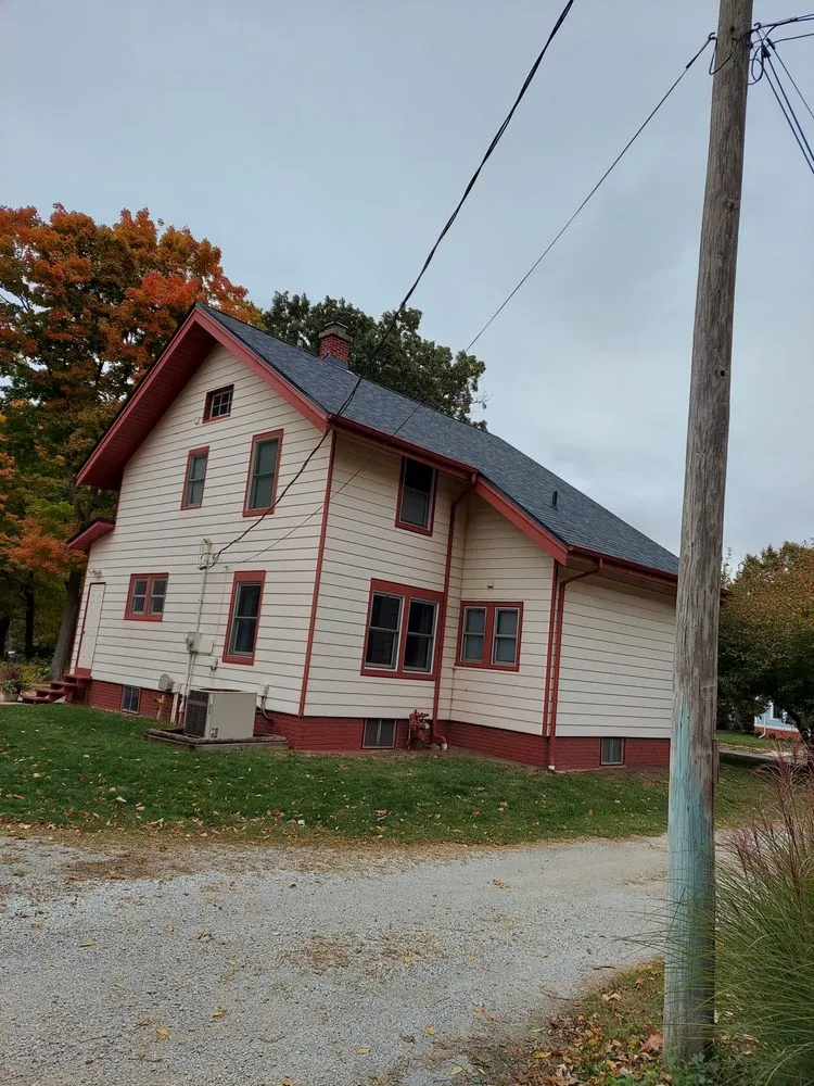 Slide of A&E Roofing & Construction