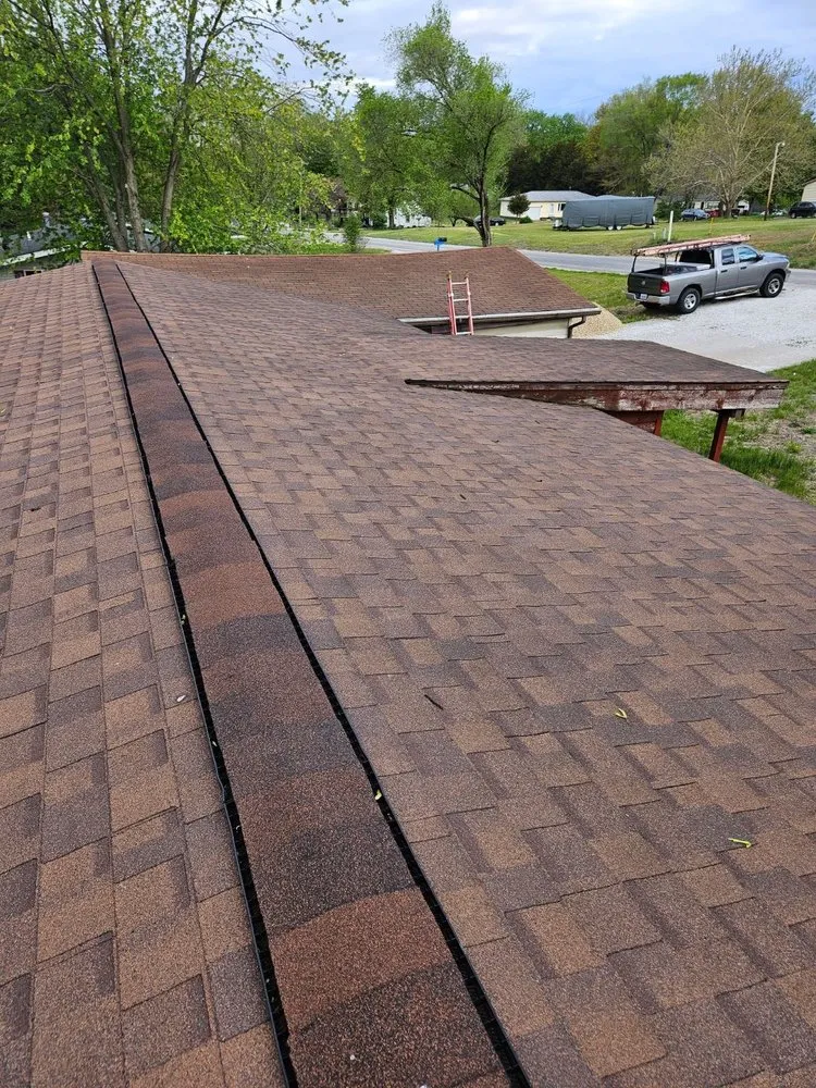 Slide of A&E Roofing & Construction