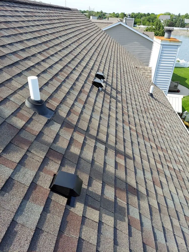 Slide of A&E Roofing & Construction