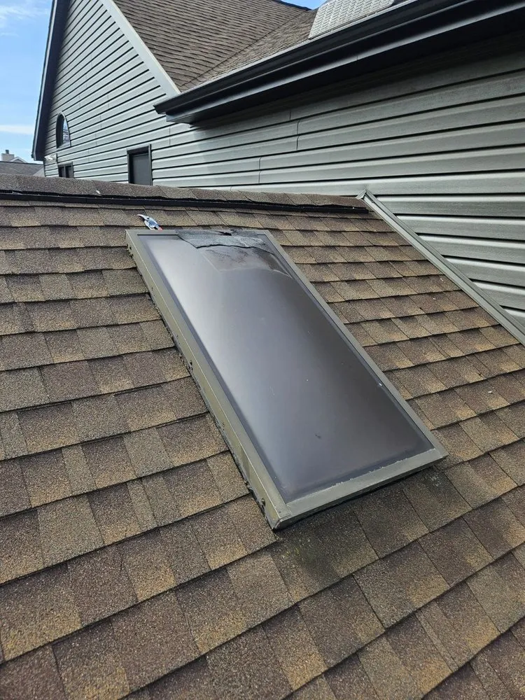 Slide of A&E Roofing & Construction