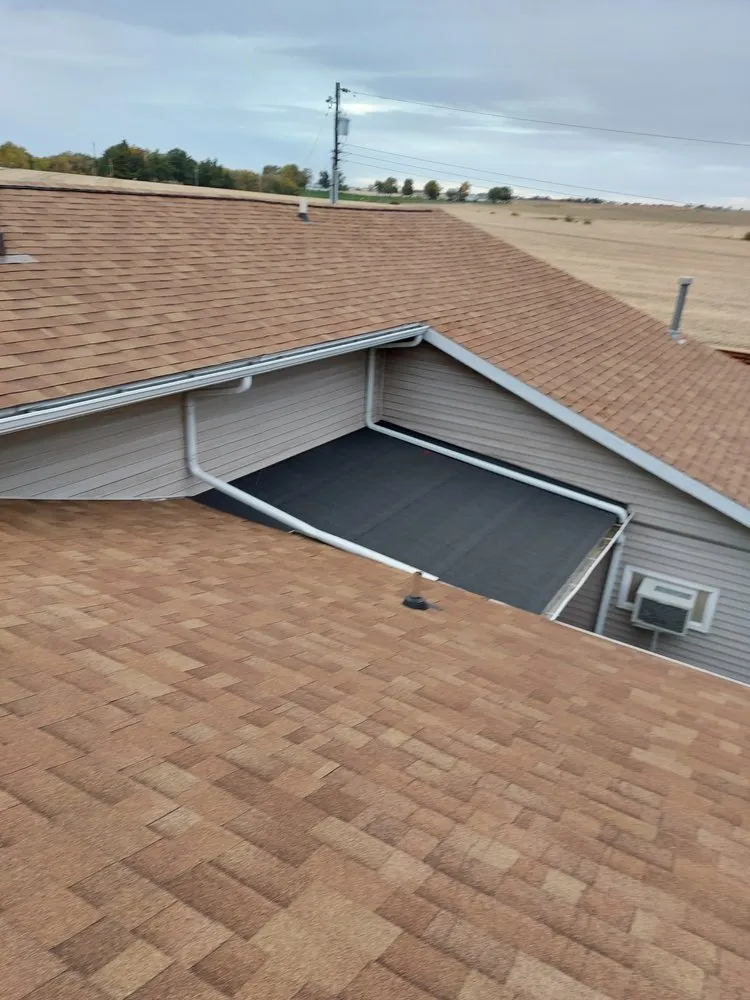 Slide of A&E Roofing & Construction