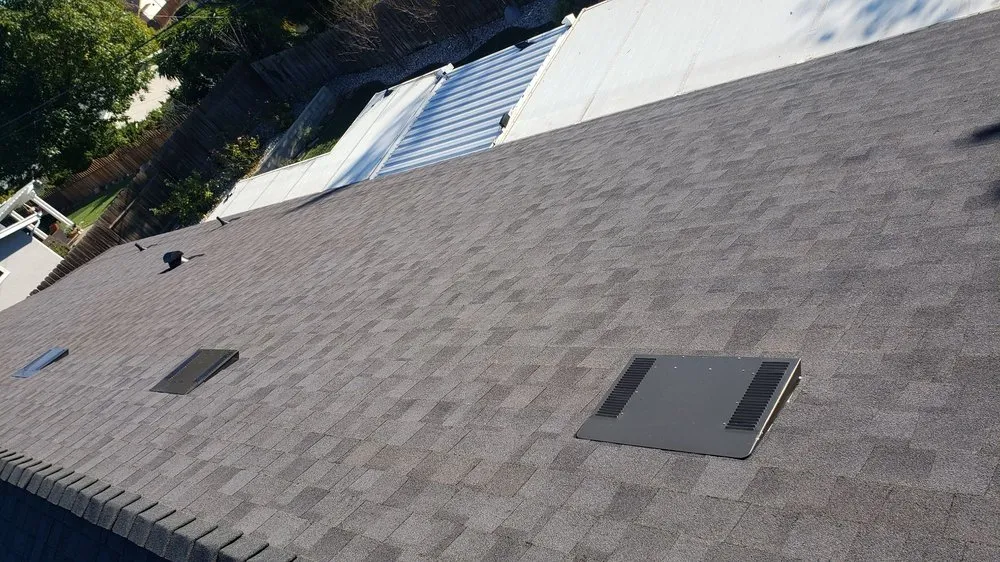 Slide of AE Roofing Experts