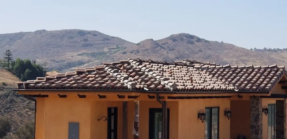 Slide of AE Roofing Experts