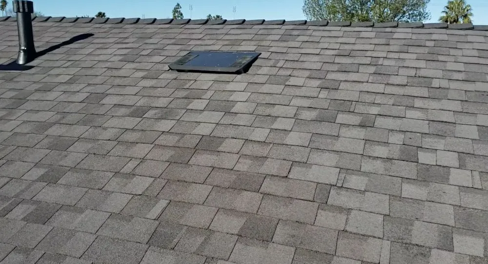 Slide of AE Roofing Experts