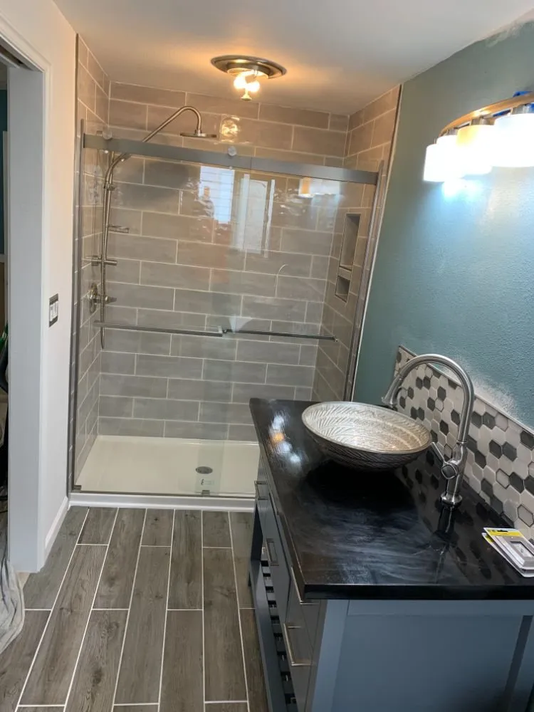 Slide of AE&I Roofing and Construction