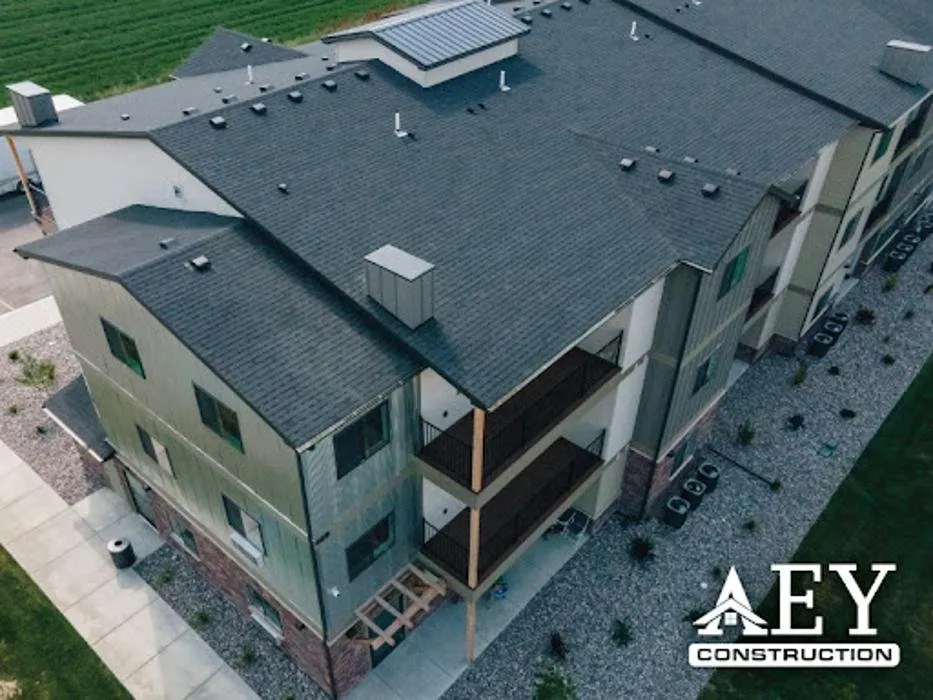 Slide of AEY Roofing Contractors