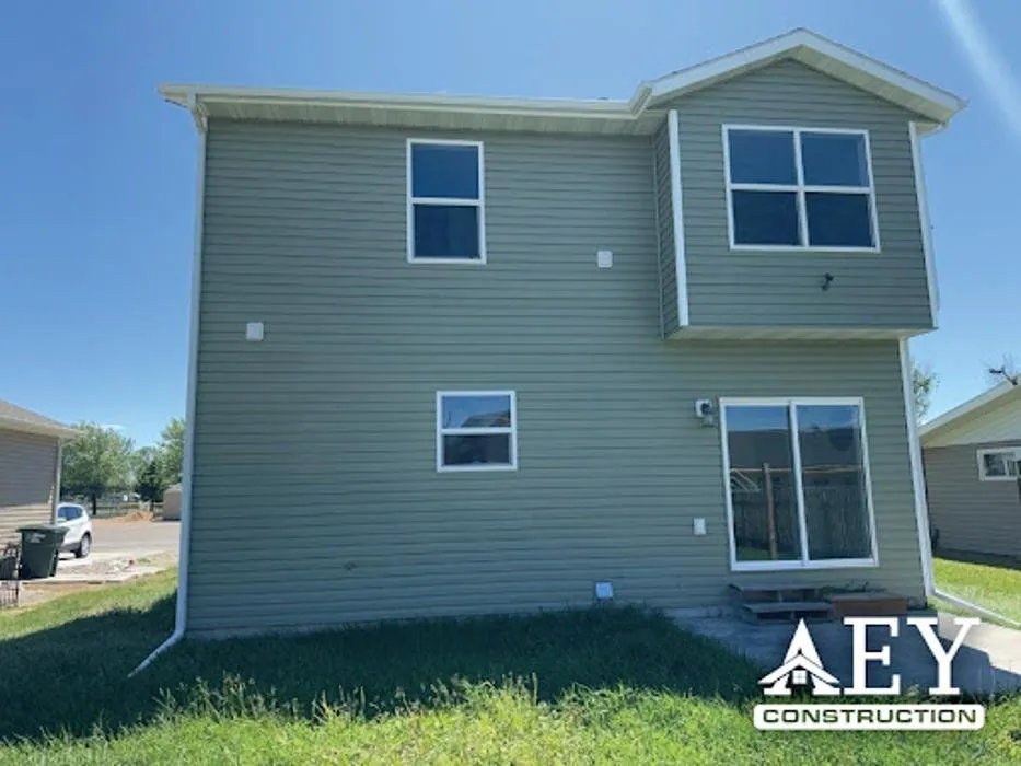 Slide of AEY Roofing Contractors